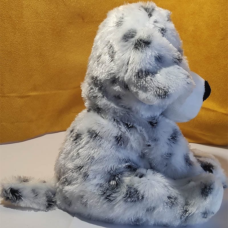 Bouillotte peluche dalmatien chauffante, vendue par Acaponcho, fabriquée en France pour une chaleur douce et réconfortante.