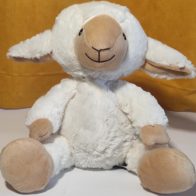 Bouillotte peluche mouton aux grandes oreilles chauffante, remplie de blé et de lavande, distribuée par Acaponcho, fabriquée en France pour une chaleur douce et réconfortante.