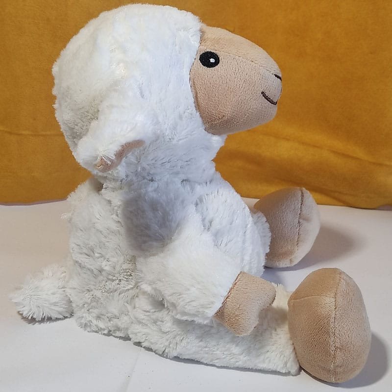 Bouillotte peluche mouton chauffante made in France distribuée par Acaponcho, pour une chaleur douce et réconfortante.