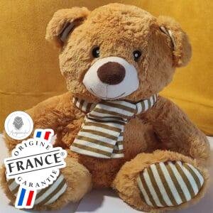 Bouillotte peluche ours chauffante, confection française garnie de blé et lavande, douce chaleur au micro-ondes, idéale pour enfants et adultes.