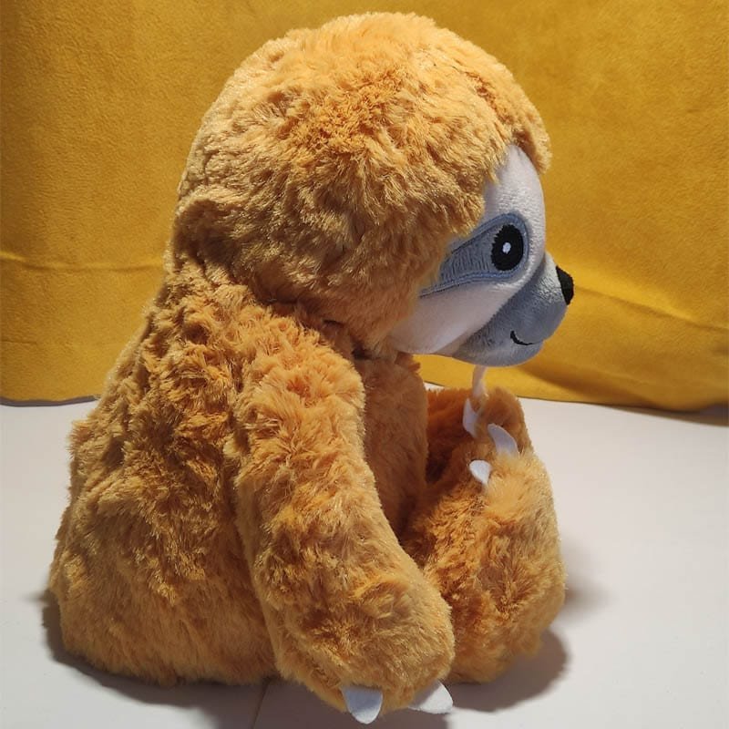 Bouillotte peluche paresseux chauffante made in France et vendue par Acaponcho, pour une chaleur douce et apaisante.